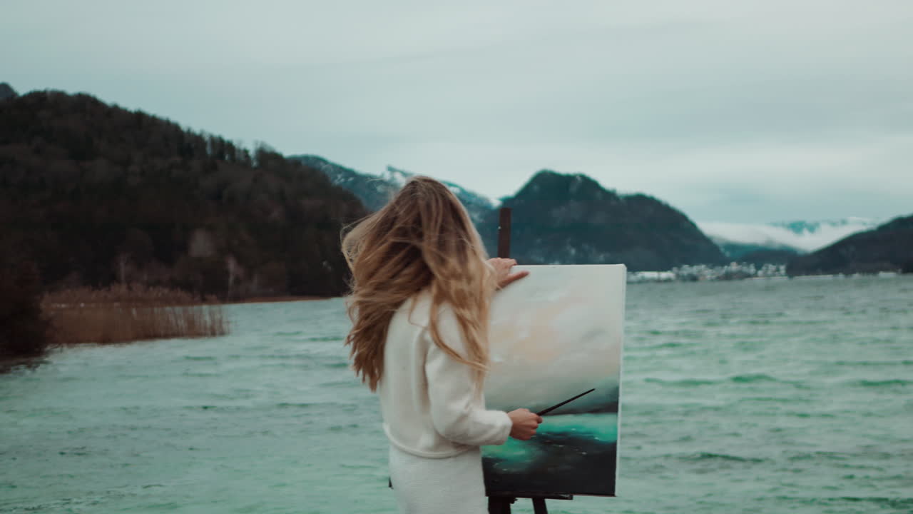 Woman Painting by the Lakeside