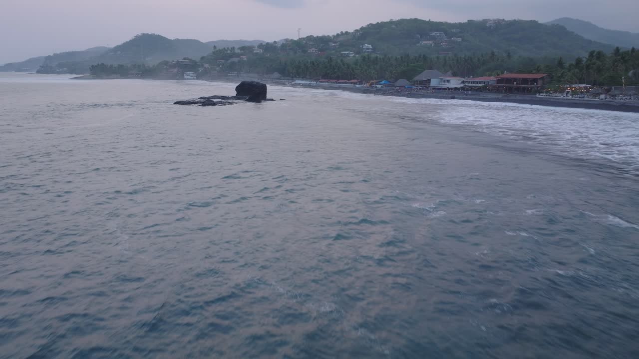 vista aérea del atardecer en el tunco el salvador