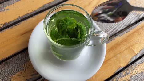 fresh mint tea with leaves outdoors