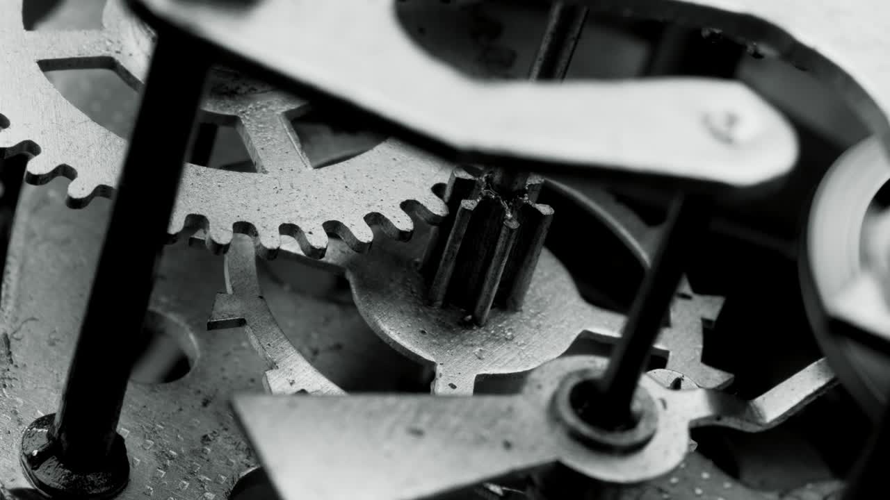 Watch mechanism macro loop. Old vintage clock mechanism working.