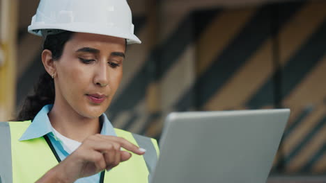 construction engineer reviewing project on tablet