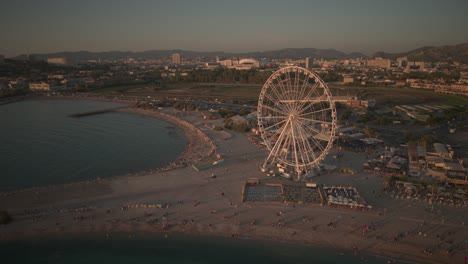 ferris wheel during golden hour clos to the sea in marseille
aerial view during golden hour in marseille by drone