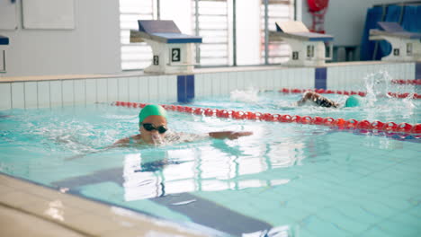people swimming in a swimming pool