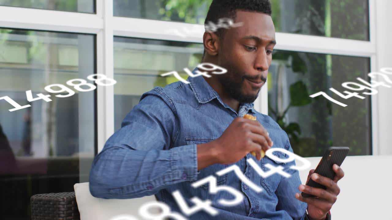 Man resting hand on sandwich biting and scrolling phone with numbers drifting showing data stream