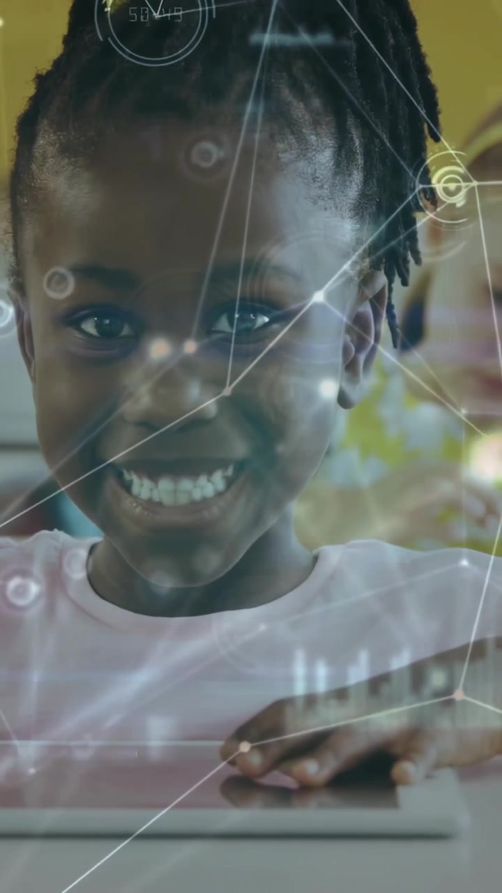 Vertical video: Student in classroom leaning on tablet, tapping screen and activating HUD, smiling