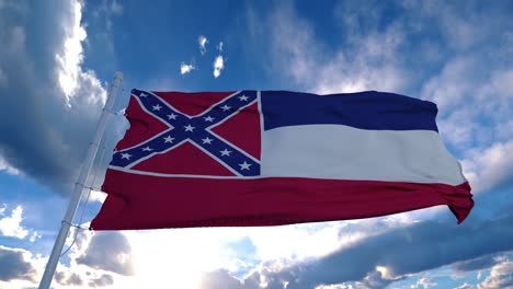 mississippi flag on a flagpole waving in the wind, blue sky background. 4k