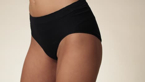 close up of hip of unrecognizable woman in underwear.