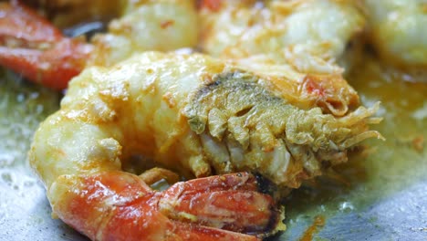 close up of cooking king prawn in a cooking pan ,