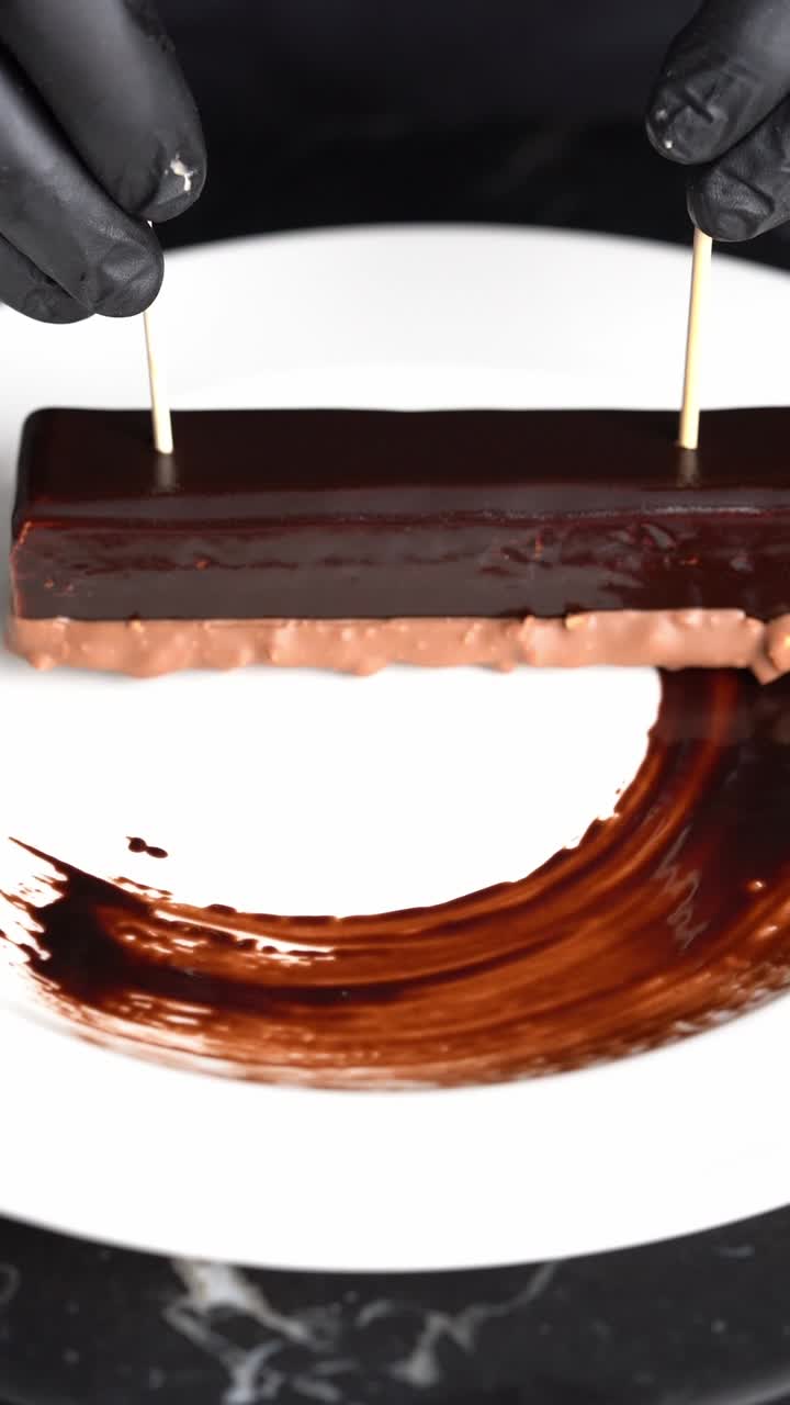 A chief prepare a gateau plate for dessert, close up shot, insert shot