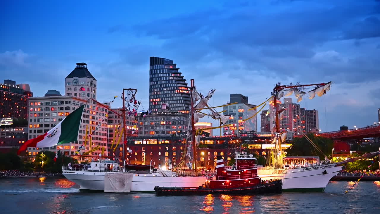 A large old-fashioned ship with wrecked masts and sails. Waterfront of New York at dusk time at backdrop