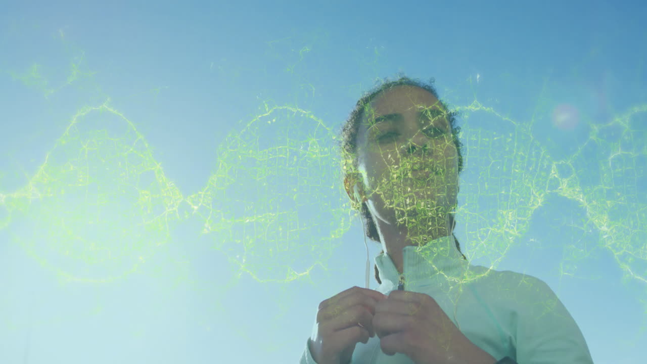 animación de una cadena de adn girando sobre una mujer que se pone auriculares durante el ejercicio