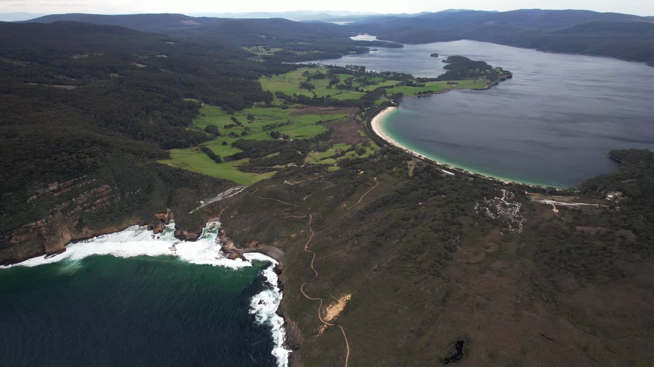 Panoramic View Of Remarkable Cave And Maingon Bay Lookout With Safety Cove State Reserve In Port Arthur, Tasmania, Australia - Drone Shot