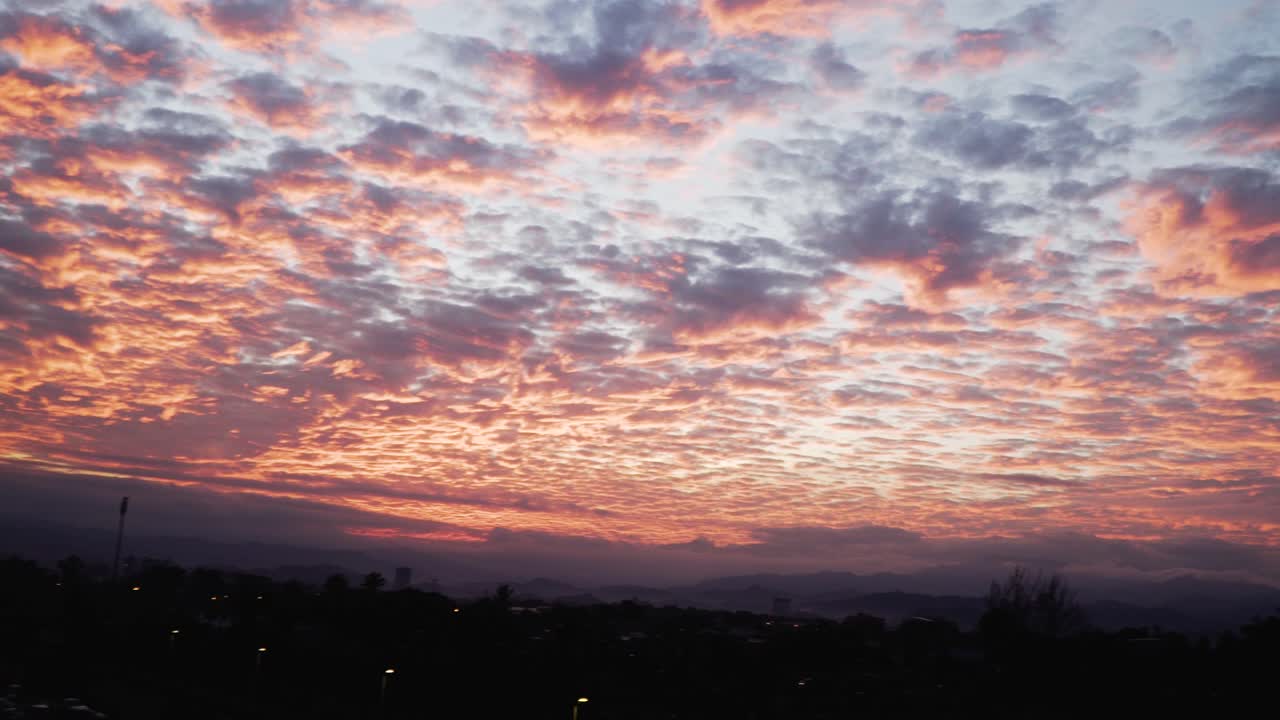 Stunning Pink and Orange Sunset over Cityscape