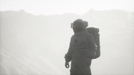 astronaut on another planet with dust and fog