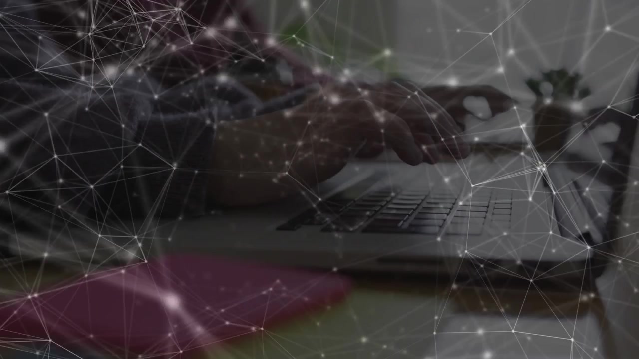 Left person touching keys, pair typing on laptops network lines pulsing then calming for tech work