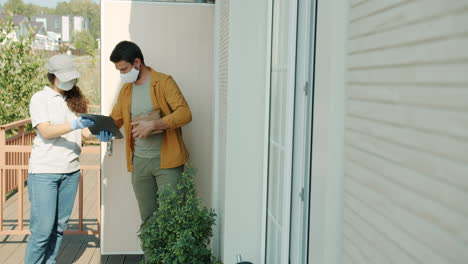 delivery person at front door during pandemic