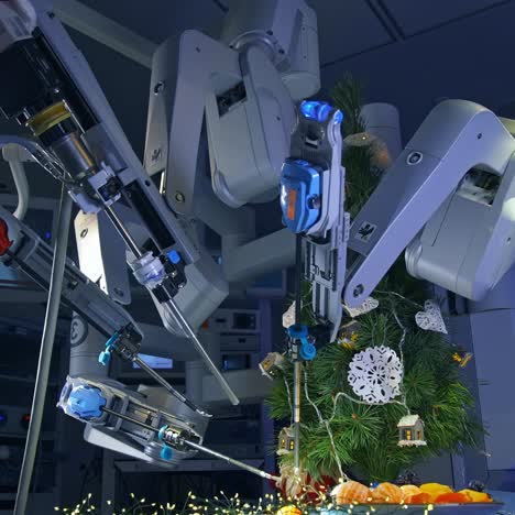 medical surgical robot arms holding and peeling mandarins. christmas tree decorated by the robotic surgery machine on the operating table. surgery room with hi-tech equipment