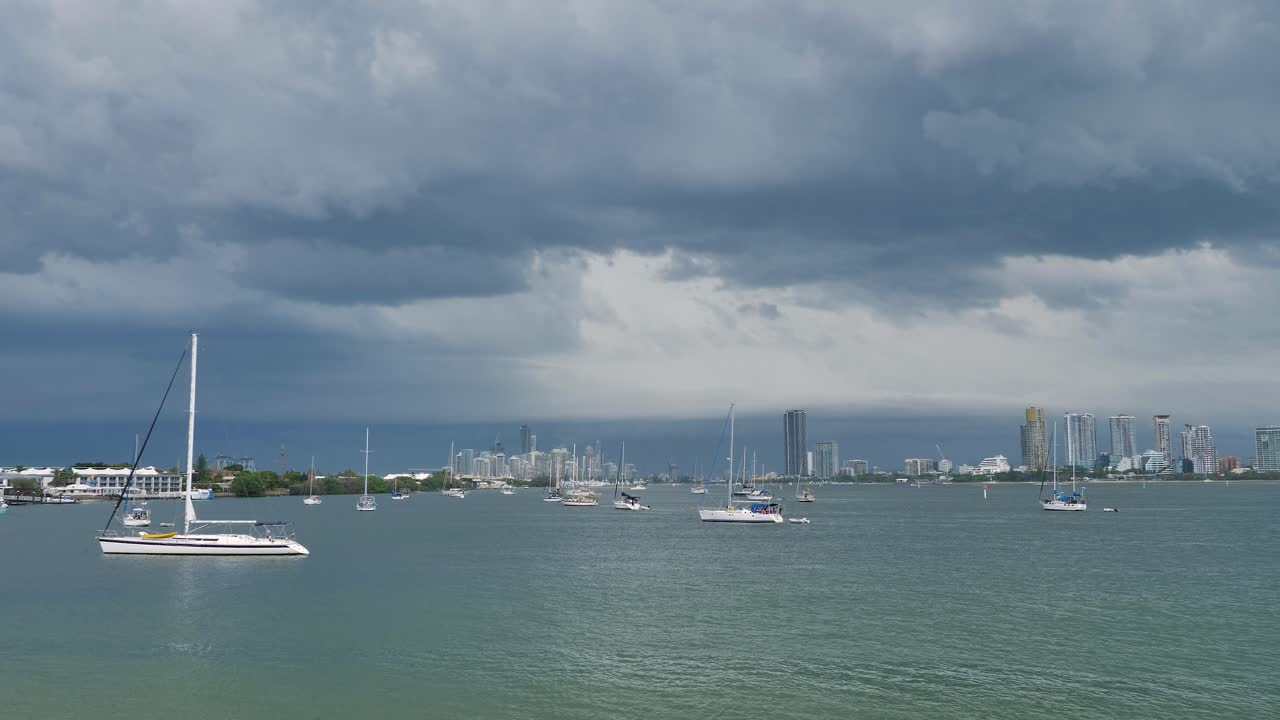Medium view of stormy weather passing over Surfers Paradise and the Broadwater on the Gold Coast, Australia