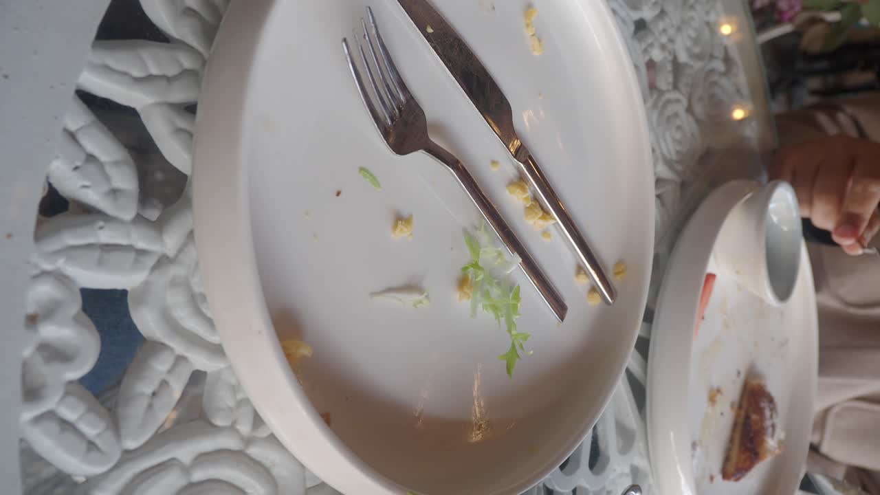 Empty Plates and Utensils at a Cafe