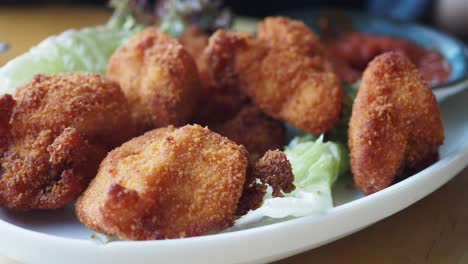 fried chicken bites with lettuce