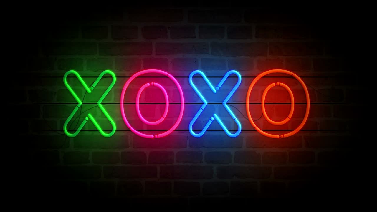 símbolo de neón xoxo en el bucle de la pared de ladrillo