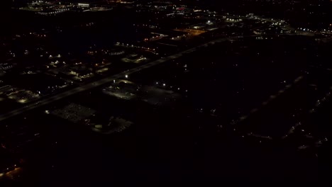 aerial shot of fireworks with city lights in the background.  city night lights.  4k footage.