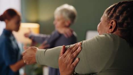 senior adults stretching in a group exercise class