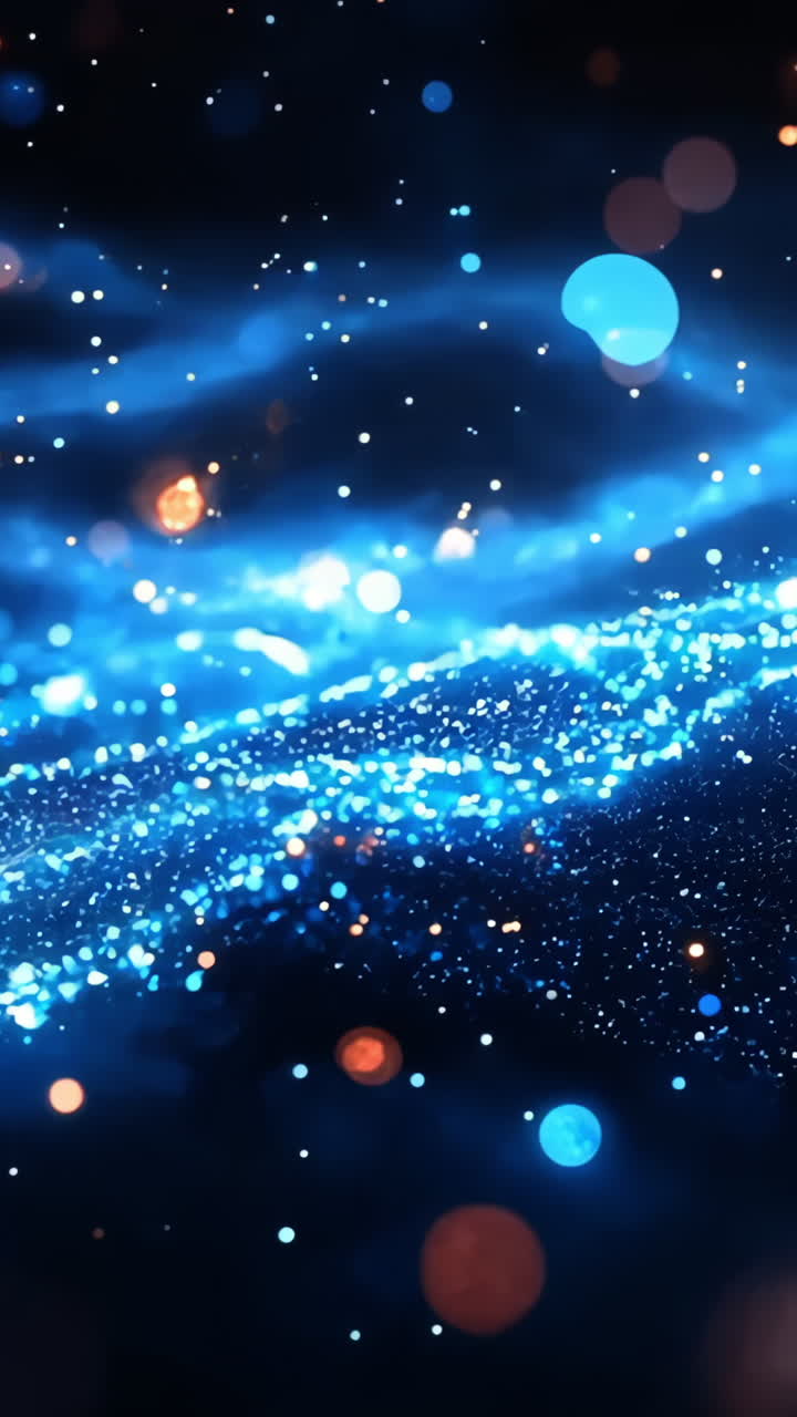 A blue and orange galaxy with many stars. The stars are scattered throughout the galaxy and are of different sizes. The galaxy is very bright and colorful, giving off a sense of wonder and awe