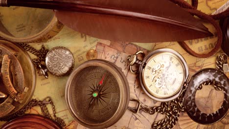 vintage style travel and adventure. vintage old compass and other vintage items on the table.