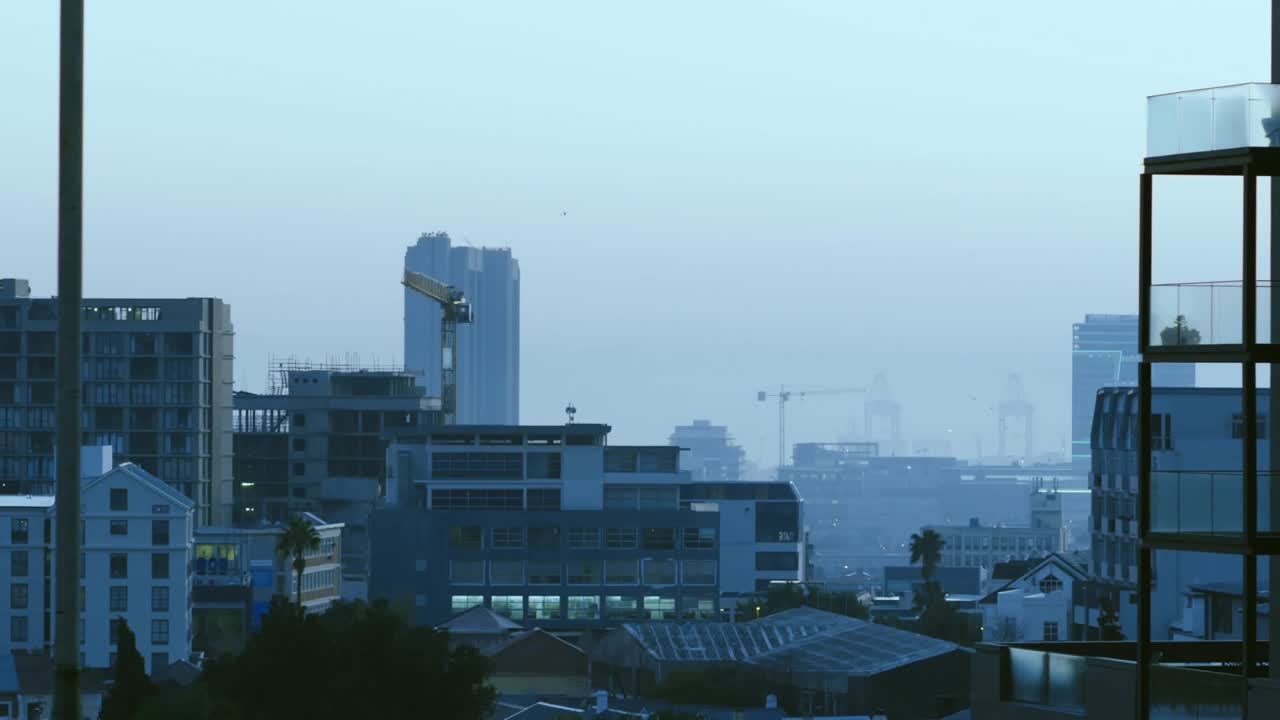 Translucent blue graphics appearing over skyline, growing and scrolling charts to show city metrics