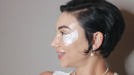 Model-bride-smiling-and-laughing-with-make-up-getting-ready-for-wedding