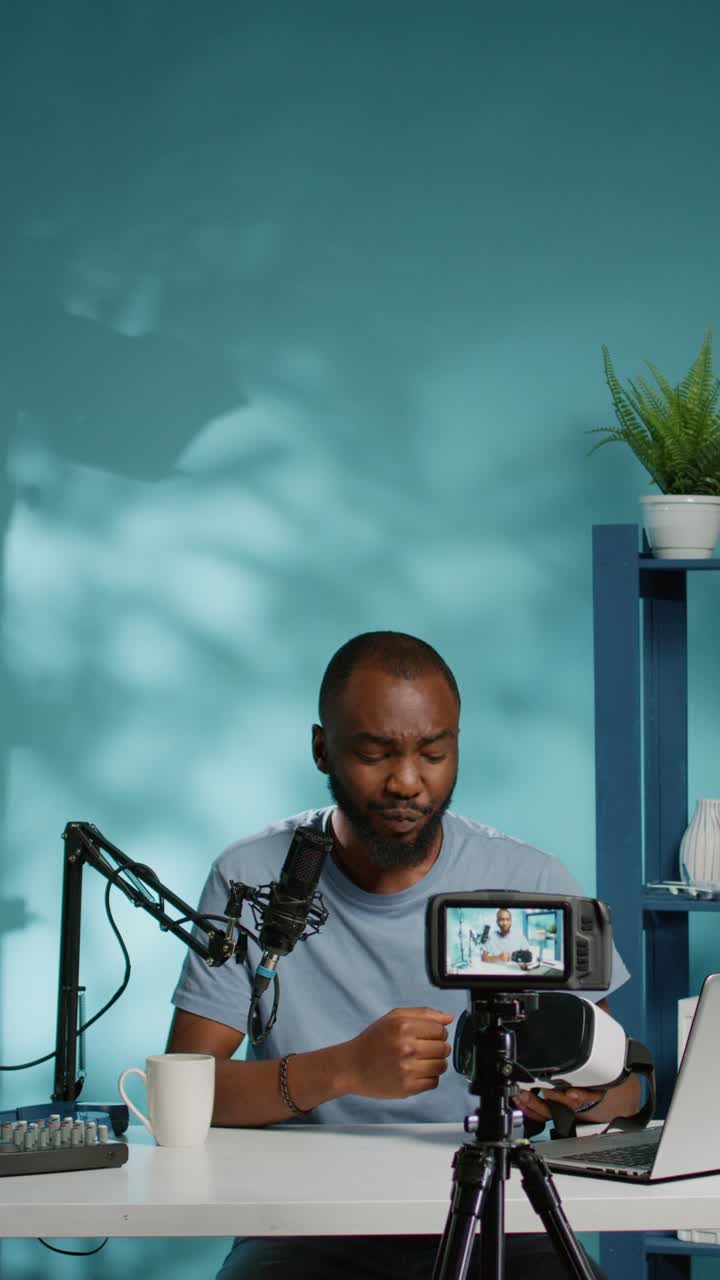 Man recording a video podcast in a studio