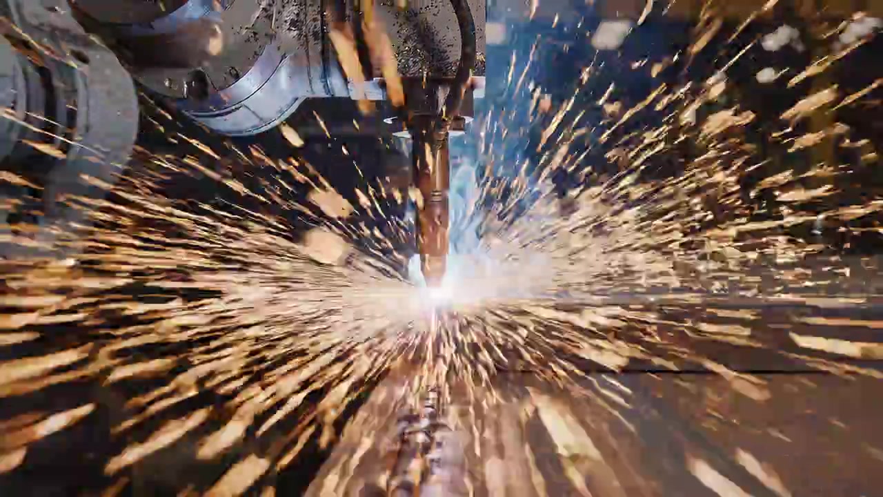 Robotic Plasma Cutting Machine Sparking During Industrial Metal Fabrication
