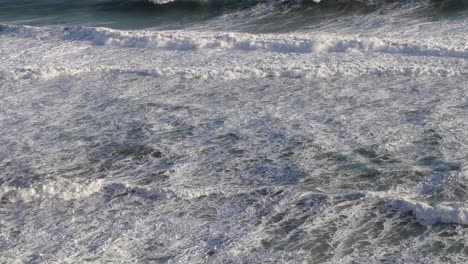 ocean waves crashing near twelve apostles, melbourne