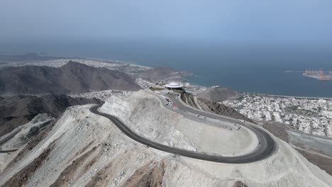 Top-view-of-Al-Suhub-Rest-House-in-Khor-Fakkan,-The-new-venue-is-580-metres-above-sea-level-and-offers-panoramic-views-of-Khor-Fakkan,-United-Arab-Emirates