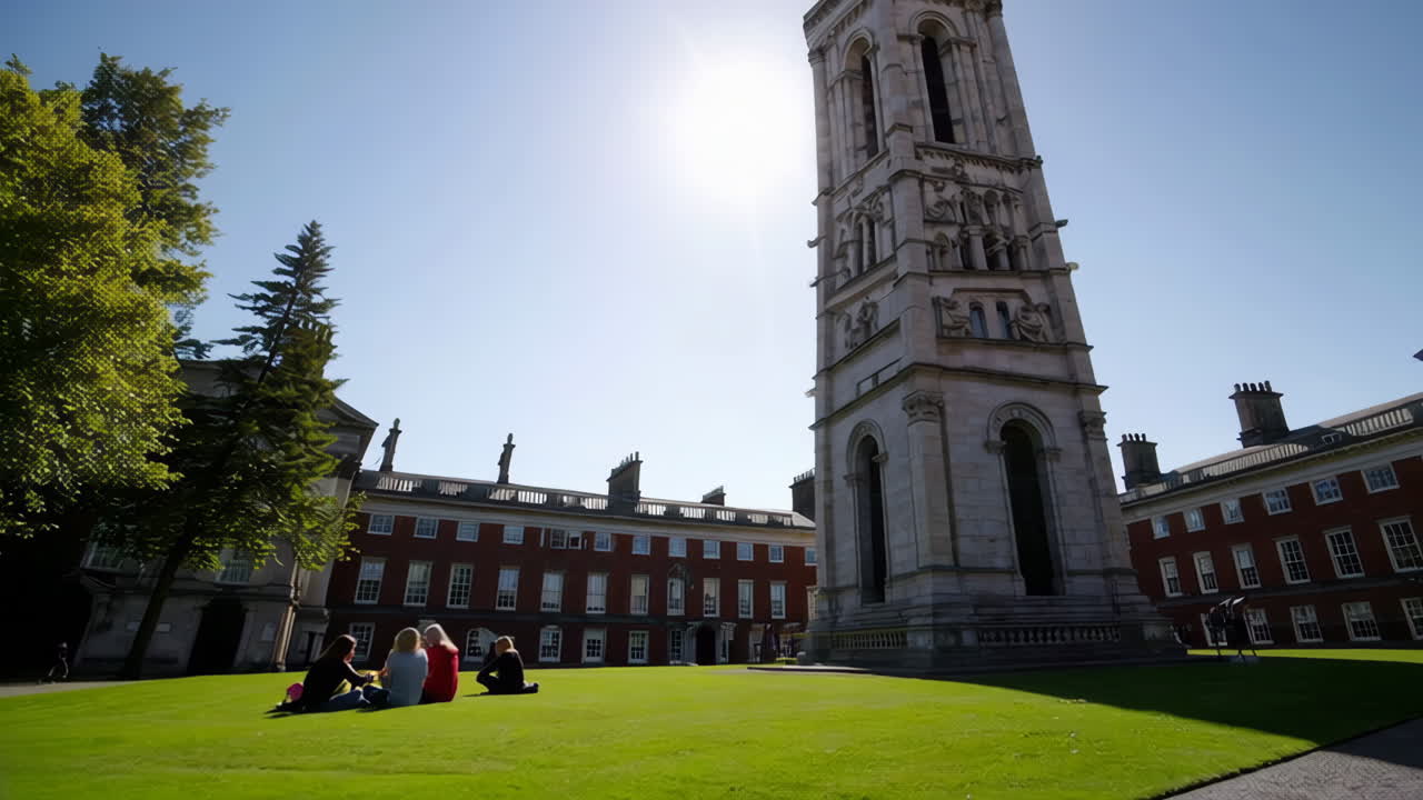 Sunlit Historic Stone Tower with Intricate Architecture