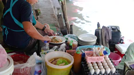 food vendor at a floating market