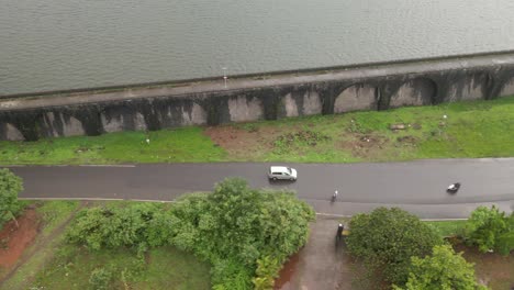 Bhushi-Dam-lonavla-drone-shot-water-fall-fog-in-rain-rainy-season-profile-follow