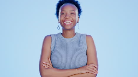 Portrait,-laughing-a-black-woman-arms-crossed