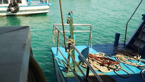 Anchor-Tied-On-Railing-Of-Ferry-Boat-Deck-With-Rope-On-The-Floor