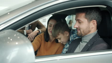 family test driving a new car