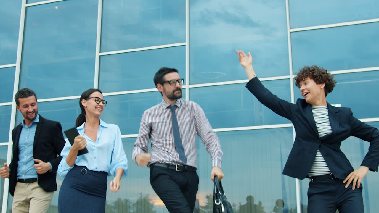 Happy Business Team Leaving the Office