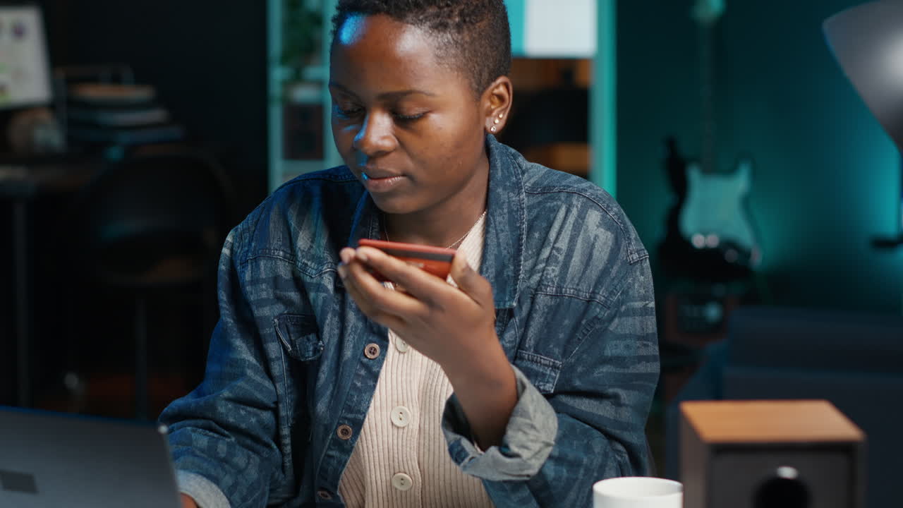 Woman using credit card for online purchase