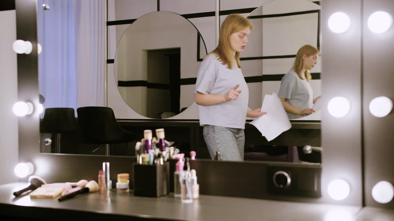 Red-haired actress practising