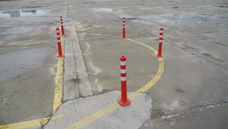 empty parking lot with cones and parking marking