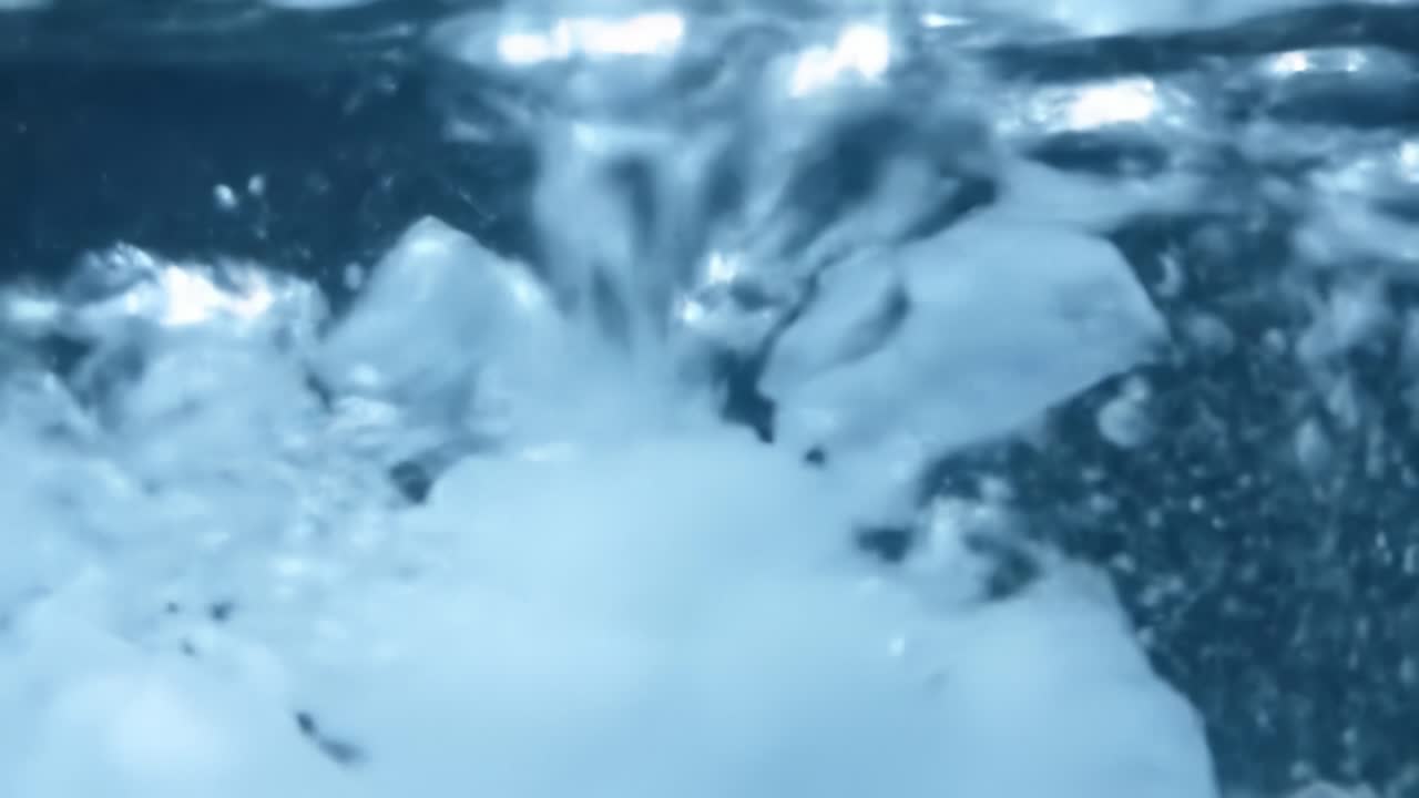 A Captivating Underwater Scene Capturing the Intricate Dance of Air Bubbles Rising Through a Layer of Ice, Creating Mesmerizing Patterns and Textures in Clear Water