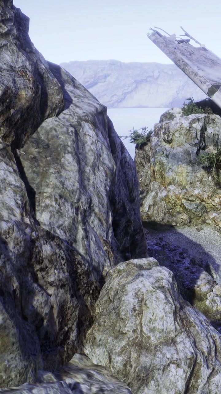 Vista panoramica di rocce e paesaggio vicino a uno specchio d'acqua di giorno.