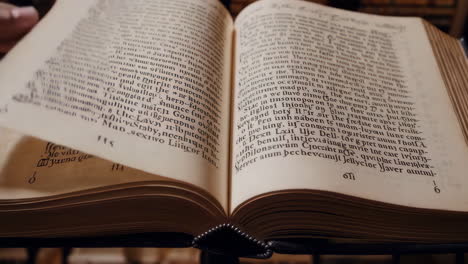 open antique books with illuminated text