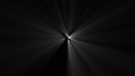 light rays shining through darkness