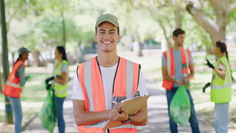 male volunteer with a clipboard in the park